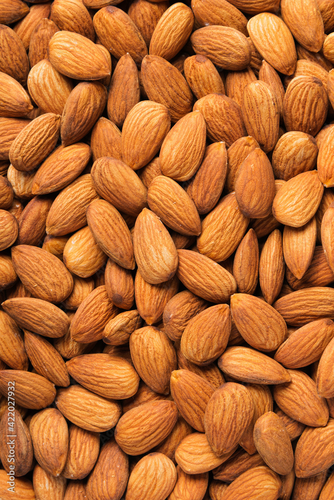 Fototapeta premium Brown almond background.