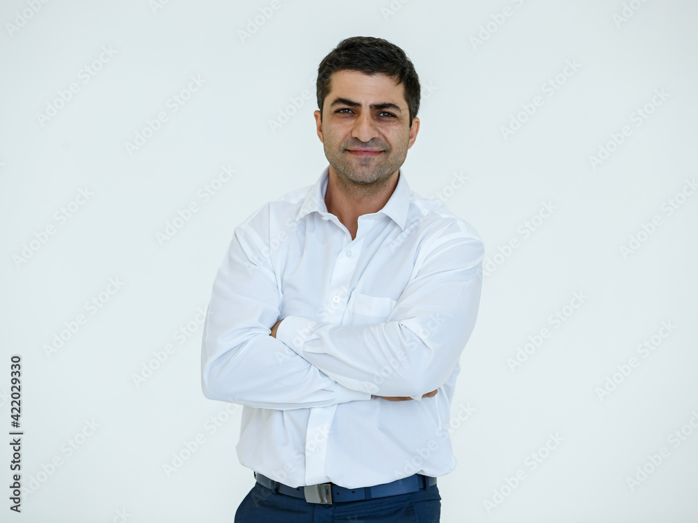 Portrait of Iranian businessman with a beard on face posing in advertising gesture with friendly and positive isolated on white background Portrait of Iranian businessman with a beard on face posing in advertising gesture with friendly and positive isolated on white background