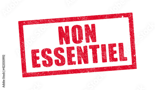 Le mot Non Essentiel en tampon encreur rouge