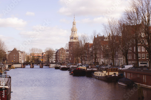 Amsterdam canals and typical houses with clear spring skies, Holland, Netherlands