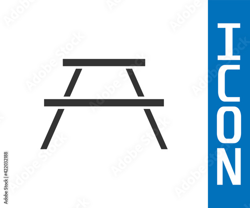 Grey Picnic table with benches on either side of the table icon isolated on white background. Vector