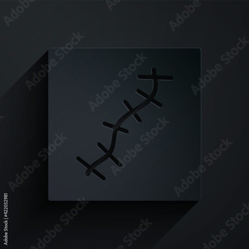 Paper cut Scar with suture icon isolated on black background. Paper art style. Vector