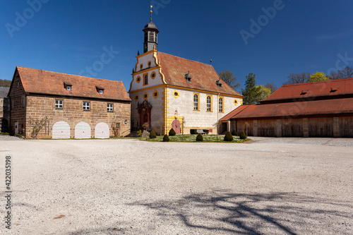 Pfarrhaus und Kirche im Schloss Eyrichshof, Naturpark Haßberge, Ort Eyrichshof bei Ebern, Landkreis Hassberge, Unterfranken, Franken, Bayern, Deutschland photo