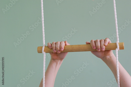 hands holding a rope