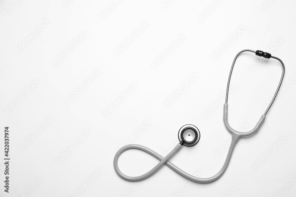 Stethoscope on white background, top view. Space for text Stethoscope on white background, top view. Space for text