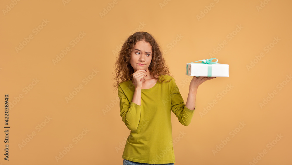 Ideas for gift, facial expressions and doubt, preparation for holiday Ideas for gift, facial expressions and doubt, preparation for holiday
