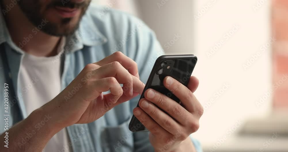 Close up view male hands holds smartphone spend free time online using mobile apps. Client of e-commerce easy distant shopping, electronic services buyer, chat on-line. Solve business remotely concept