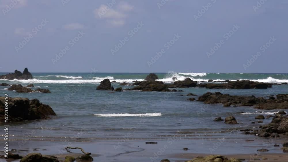 Stony coast, the sea and waves in the Corkovado National Park on the Osa Peninsula, Costa Rica Stony coast, the sea and waves in the Corkovado National Park on the Osa Peninsula, Costa Rica
