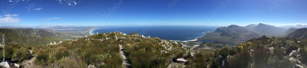 panorama of the mountains and the town of kleinmond panorama of the mountains and the town of kleinmond