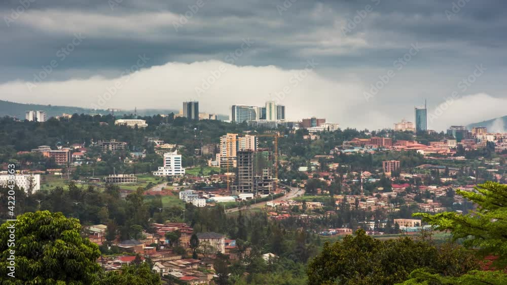 Timelapse video of Kigali city skyline and surrounding areas, showing movement of clouds and cars. Rwanda Timelapse video of Kigali city skyline and surrounding areas, showing movement of clouds and cars. Rwanda