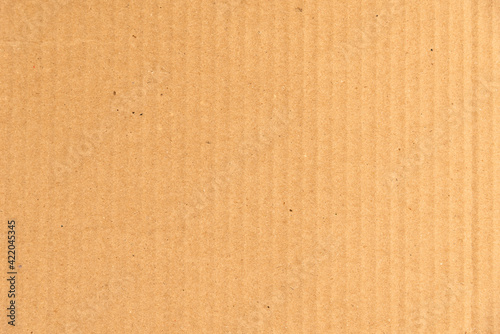 Cardboard paper yellowish background - template from packaging cardboard made from recycled materials