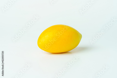 Yellow Marian plum on white background. Isolated of Marian plum fruit.