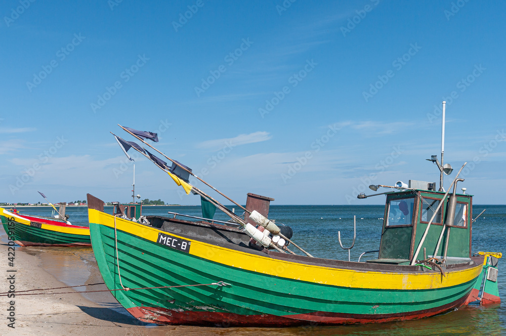 Naklejka premium fishing boat on the beach. Baltic Sea, Puck Bay, Poland