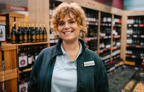Friendly wine store worker