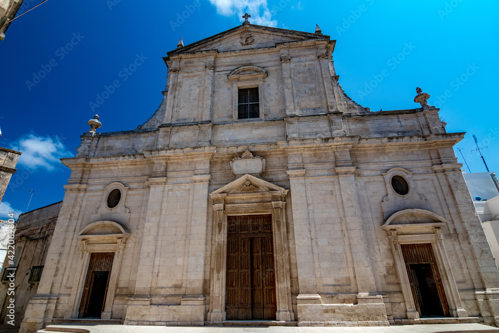 Church front façade. Mesagne. Puglia, Italy under the clear blue sky of a sunny summer day, travel photography, street view.