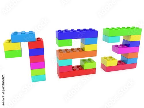 Numbers 1 2 3 of colored toy bricks on white