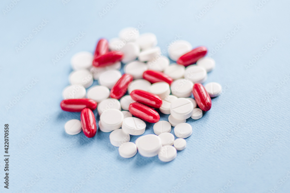 Tablets on a blue background. The concept of medicine Tablets on a blue background. The concept of medicine
