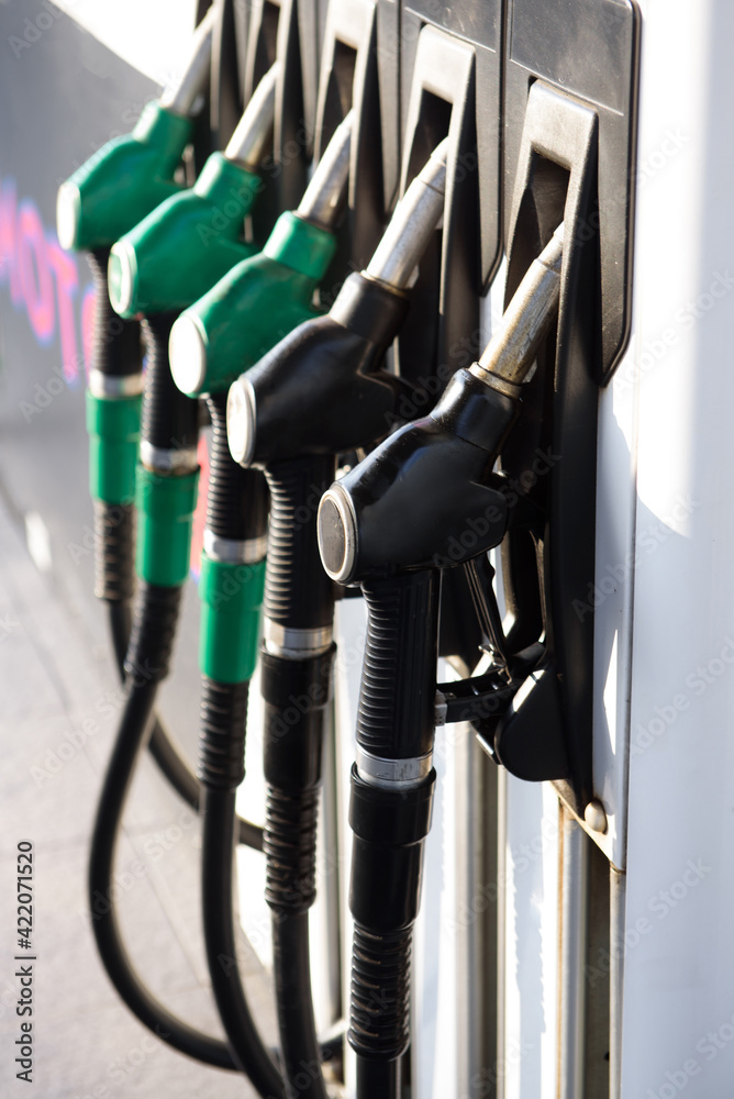 Green and yellow colorful fuel, gas station. Gas station in operation. Green and yellow colorful fuel, gas station. Gas station in operation.