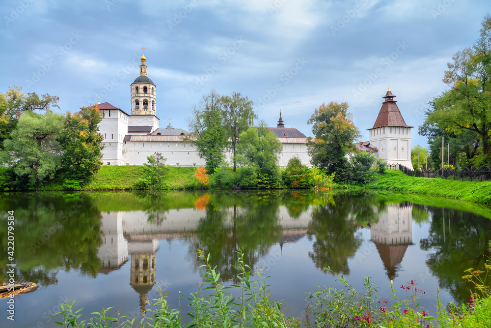 St. Paphnutius of Borovsk Monastery reflecting in water, Kaluga oblast, Russia