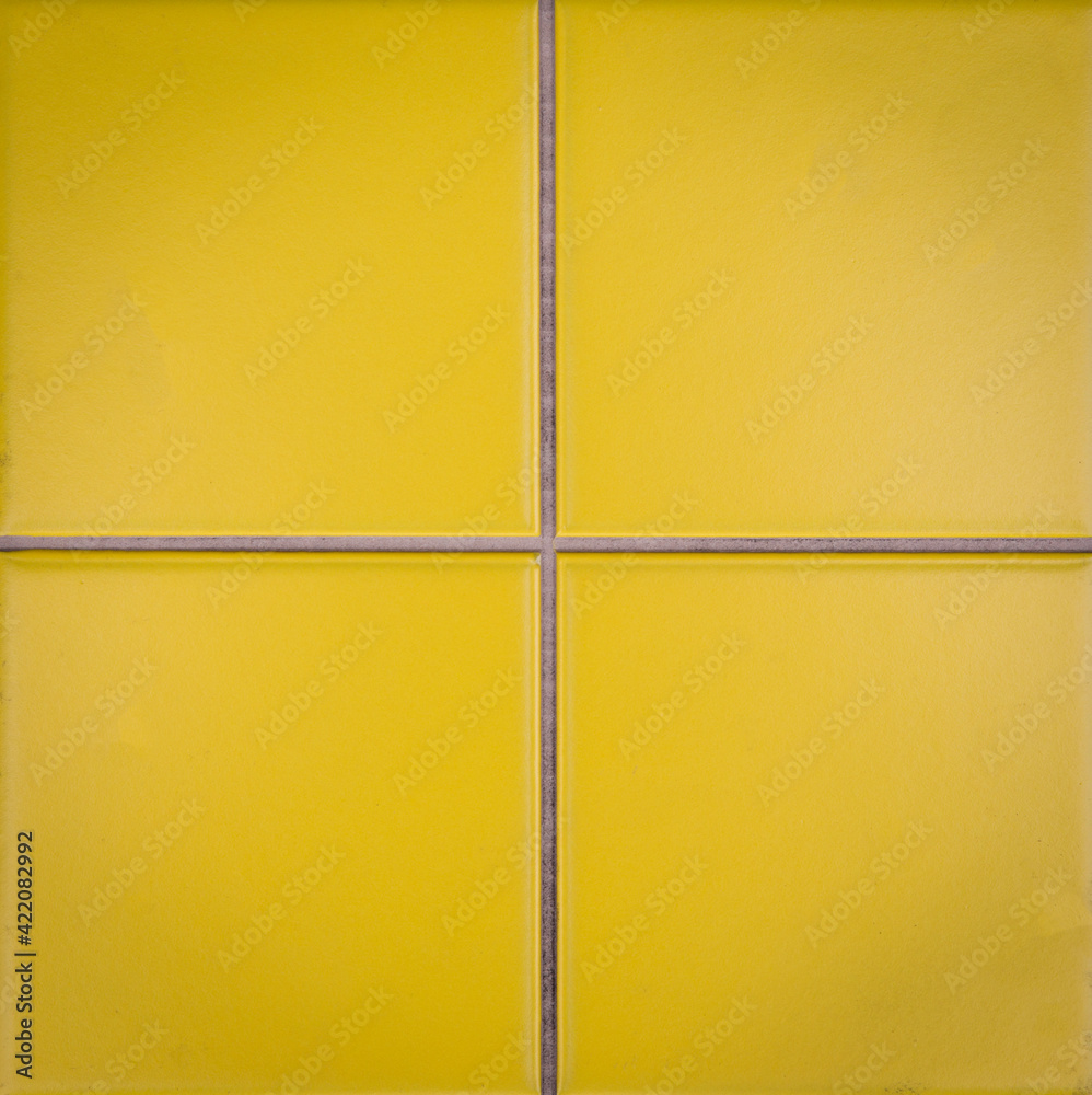 Fototapeta premium Detail of yellow ceramic mosaic for bathroom interior.