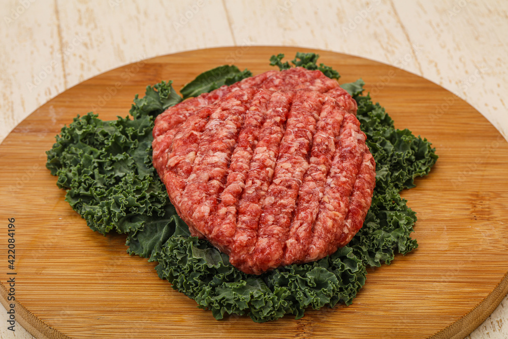 Raw beef burger cutlet for cooking