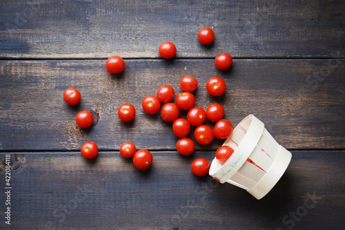 Cherry tomatoes on wooden from market