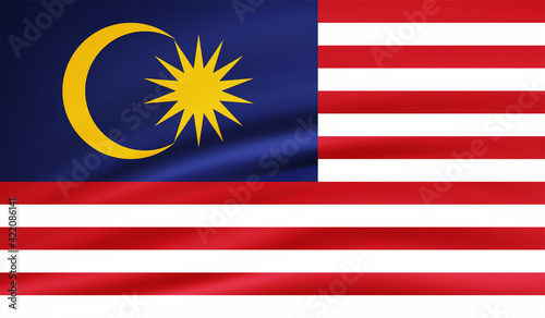 Grunge Vector Illustration of a waving Malaysian flag.