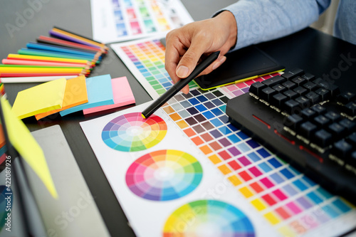 Graphic designer work with Color swatch samples Graphic Skill Concept.