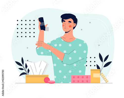 Man with pollen allergy or asthma using an inhaler