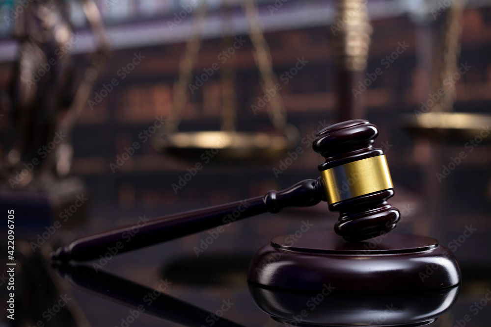 Law theme. Court library - gavel of the judge and books. Law theme. Court library - gavel of the judge and books.