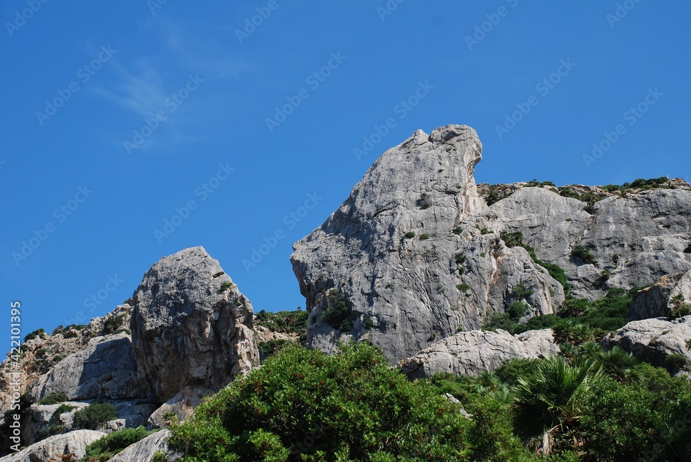 The rocky peaks of the Tramuntana mountains in the Boquer valley trail near Puerto Pollensa on the Spanish island of Majorca 