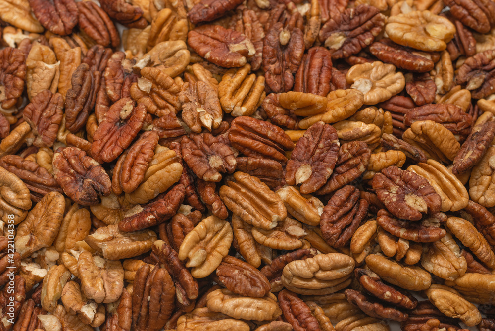 Tasty pecan-nut background. Top view. Tasty pecan-nut background. Top view.