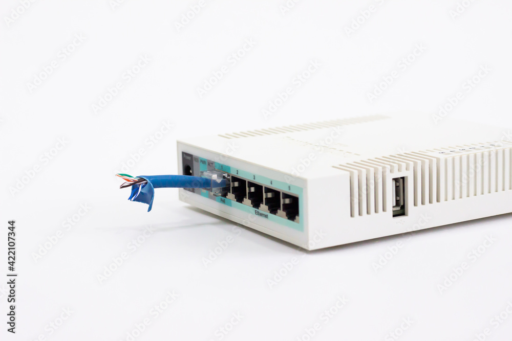 Wi-Fi router with cut cable. White router with dangling cord. On white background router with connections. Wi-Fi router with cut cable. White router with dangling cord. On white background router with connections.