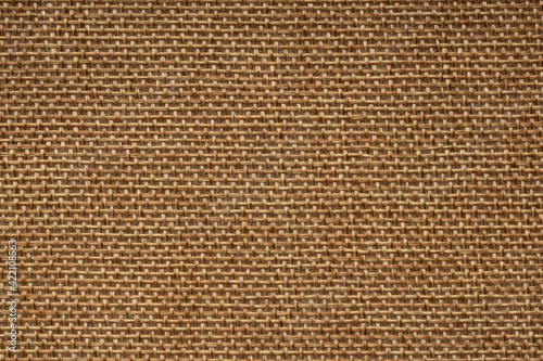 Textured background of rough natural sackcloth close up