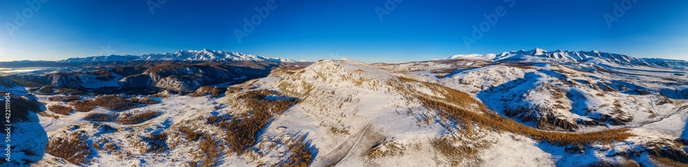 Panorama of Altai mountains in autumn. Seminsky ridge. Fog in the mountains. Aerial view. Original dimentions: 24357px x 5909px. Panorama of Altai mountains in autumn. Seminsky ridge. Fog in the mountains. Aerial view. Original dimentions: 24357px x 5909px.