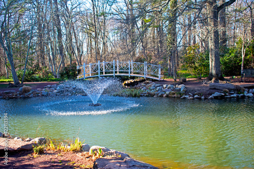 Scenic view of lake, fountain, and small bridge at Sayen Gardens, Hamilton, New Jersey, USA -02