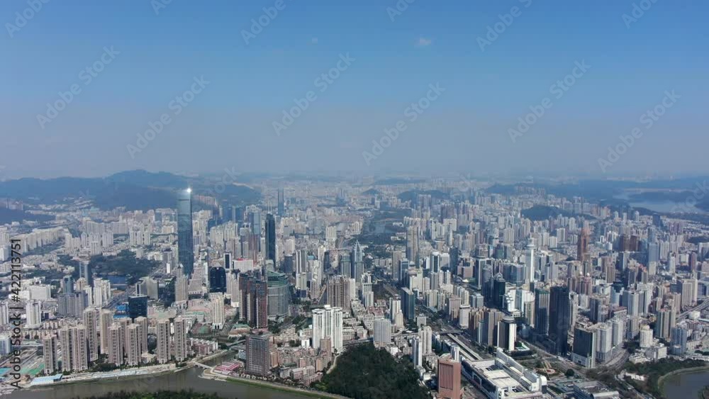 Aerial view over Shenzhen skyline on a beautiful clear day. Aerial view over Shenzhen skyline on a beautiful clear day.