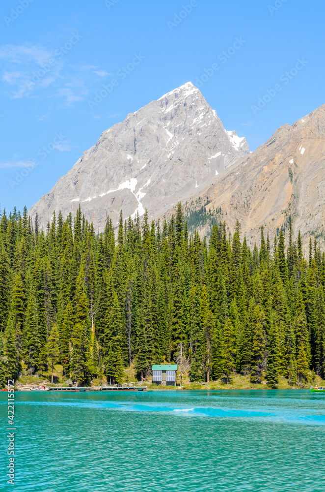 Mountain Lake with Blue Sky and White Clouds in Canada.