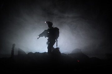 Anti-riot police give signal to be ready. Government power concept. Police in action. Smoke on a dark background with lights. Blue red flashing sirens. Dictatorship power