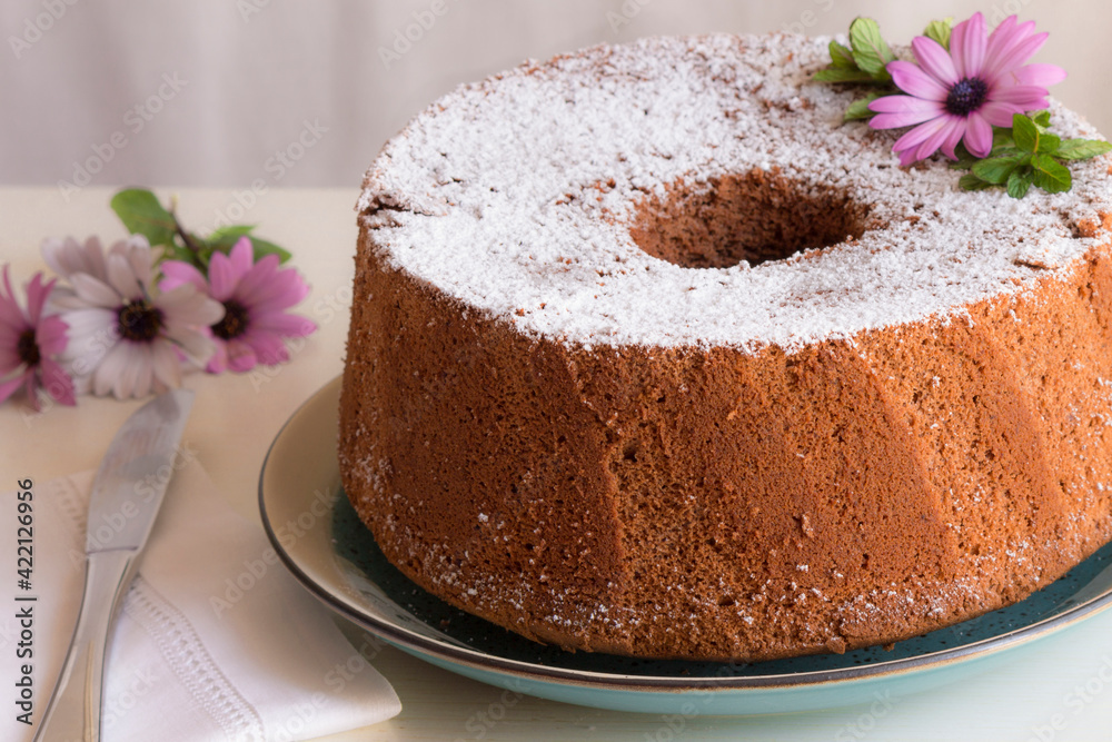 chiffon cake with chocolate and flowers 