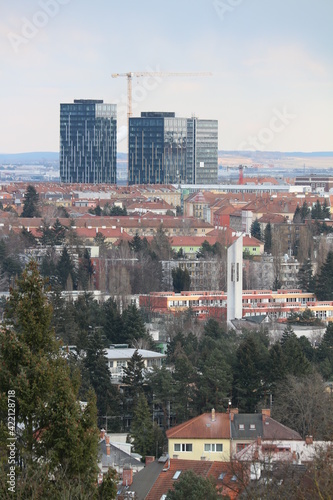 A view to three high office building with crane between at Brno, Czech republic