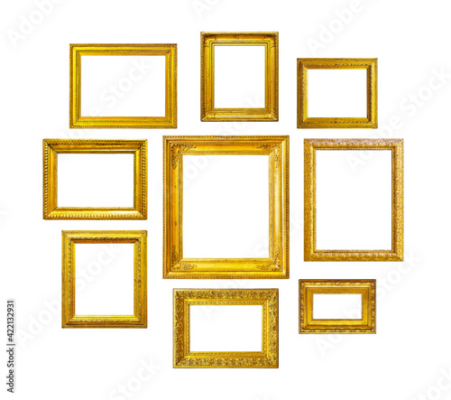 Set of golden frames for paintings, mirrors or photo isolated on white background.