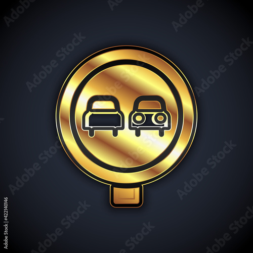 Gold No overtaking road traffic icon isolated on black background. Traffic rules and safe driving. Vector
