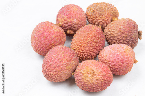 Lychee fruit isolated above white background