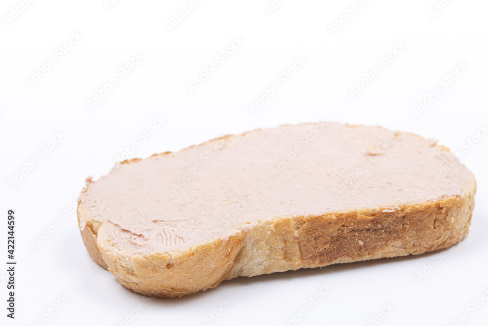 Sliced of bread with pate isolated above white background