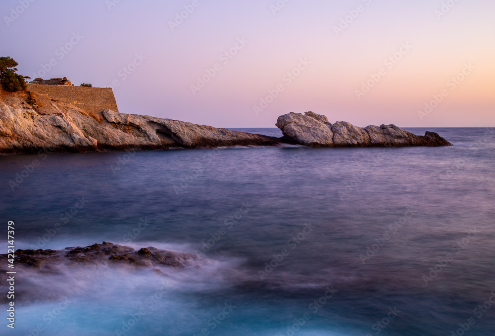 Sea rocks at the sunrise in Ikaria, Greece Sea rocks at the sunrise in Ikaria, Greece
