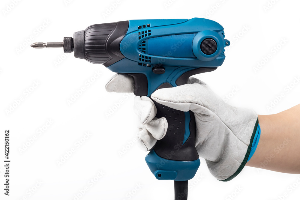 studio lighting. the human hand in it is an electric impact screwdriver. On a white background. Close-up.