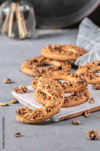 Cookies with nuts on rustic background