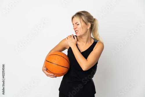 Young Russian woman playing basketball isolated on white background suffering from pain in shoulder for having made an effort