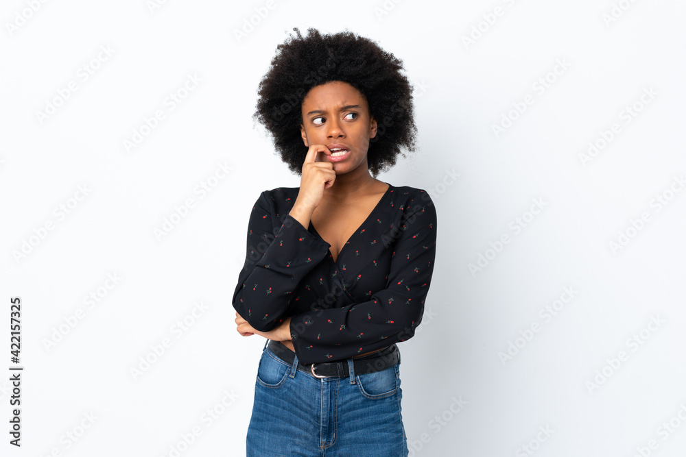 Young African American woman isolated on white background nervous and scared Young African American woman isolated on white background nervous and scared